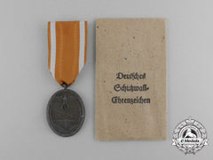 A Second War German West Wall Commemorative Medal With Packet Of Issue By Carl Poellath