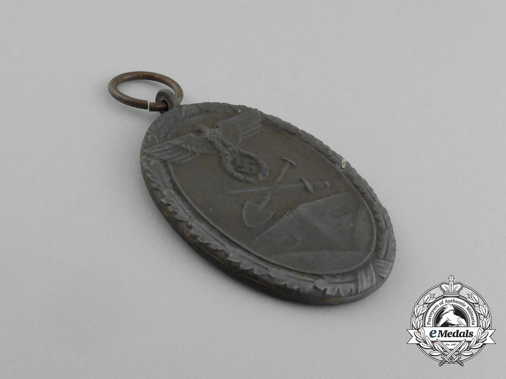 a_second_war_german_west_wall_commemorative_medal_with_packet_of_issue_by_carl_poellath_e_6309