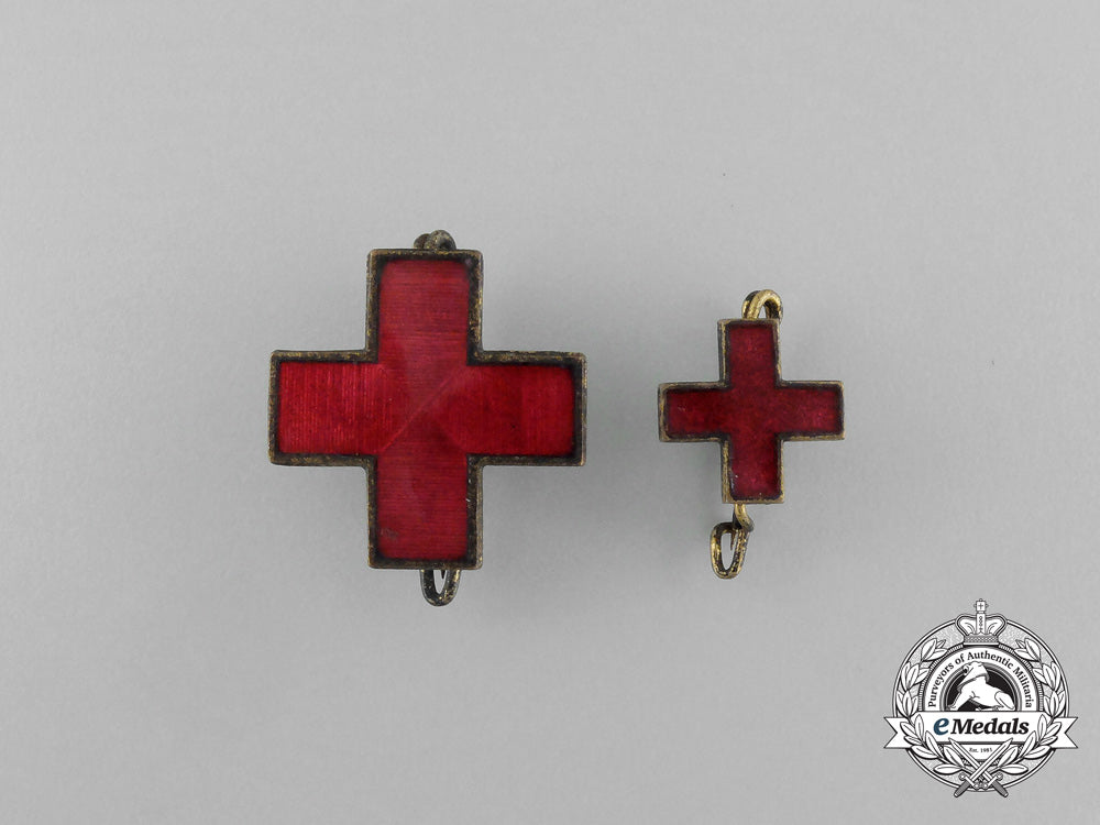 a_grouping_of_two_drk(_deutsches_rotes_kreuz)_badges_e_6481