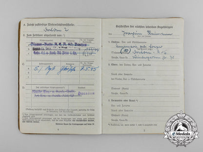 a_large_golden_party_badge_with_documents_to_wehrmacht_gefreiter_reimann_e_6554