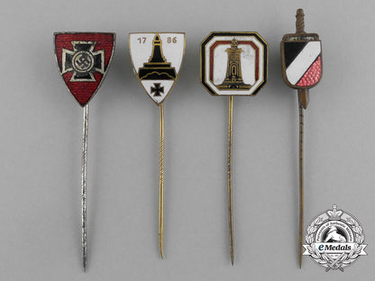 a_grouping_of_four_second_war_german_veteran’s_organization_stick_pins_e_6766
