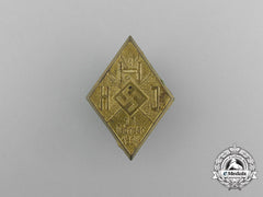 A 1934 Hj/Whw (Winter Relief Of The German People) Donation Badge