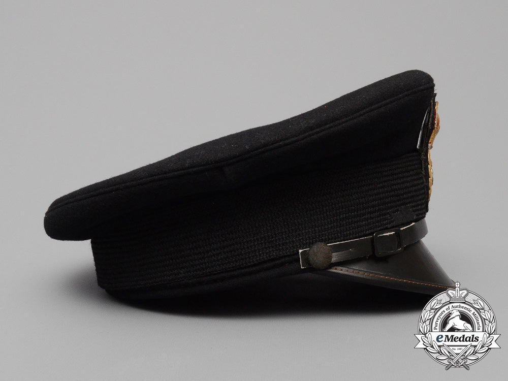 a_canadian_chief_petty_officer's_visor_cap_and_officer's_beret_e_7832