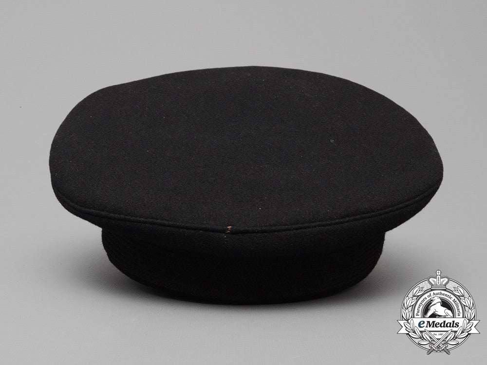 a_canadian_chief_petty_officer's_visor_cap_and_officer's_beret_e_7833
