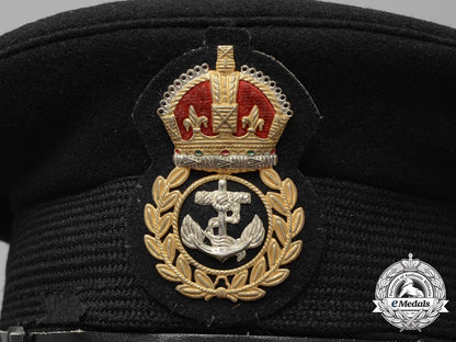 a_canadian_chief_petty_officer's_visor_cap_and_officer's_beret_e_7835