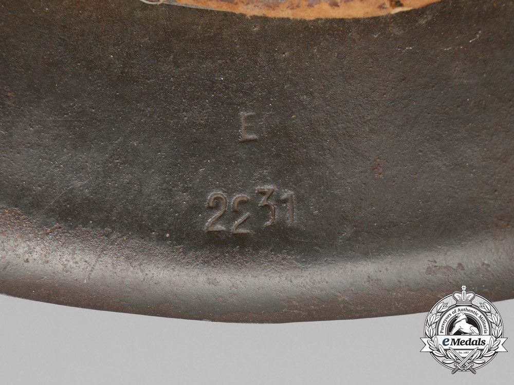 germany,_heer._an_m42_wehrmacht_stahlhelm_with_a_m31_bread_bag_strap_e_8022