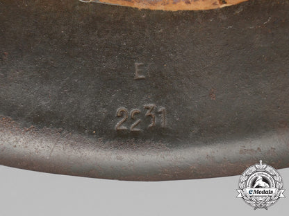 germany,_heer._an_m42_wehrmacht_stahlhelm_with_a_m31_bread_bag_strap_e_8022