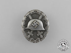 An Early Silver Grade Wound Badge By The Official Mint Of Vienna