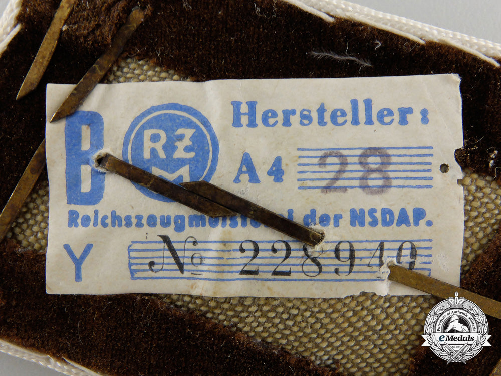 a_pair_of_kreis_hauptabschnittsleiter_tabs;_rzm_tagged_em25c