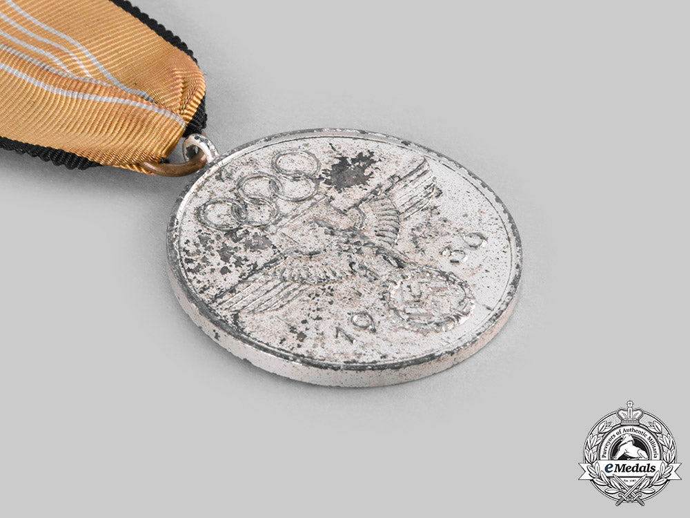 germany,_third_reich._a1936_berlin_summer_olympic_games_medal,_with_case__emd1192_c20_01655