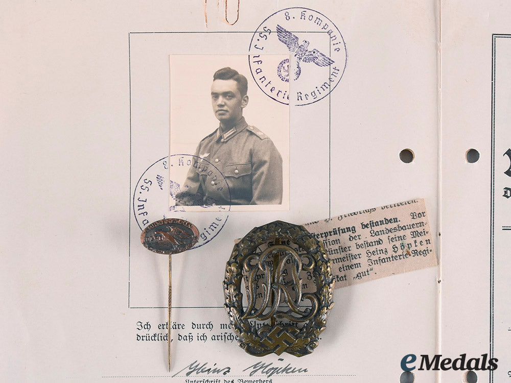 germany,_drl._a_drl_sports_badge,_bronze_grade_with_booklet_and_stick_pin,_to_heinz_höpfen__emd1911_m20_01837