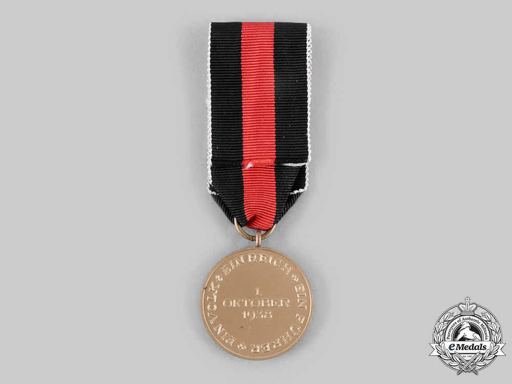 germany,_third_reich._a_sudetenland_medal_with_award_document,_flak_regiment231__emd3841_c20_02168