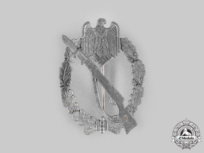 germany,_wehrmacht._an_infantry_assault_badge,_silver_grade_with_award_document_to_gefreiten_hans_sammet__emd3862_c20_02161