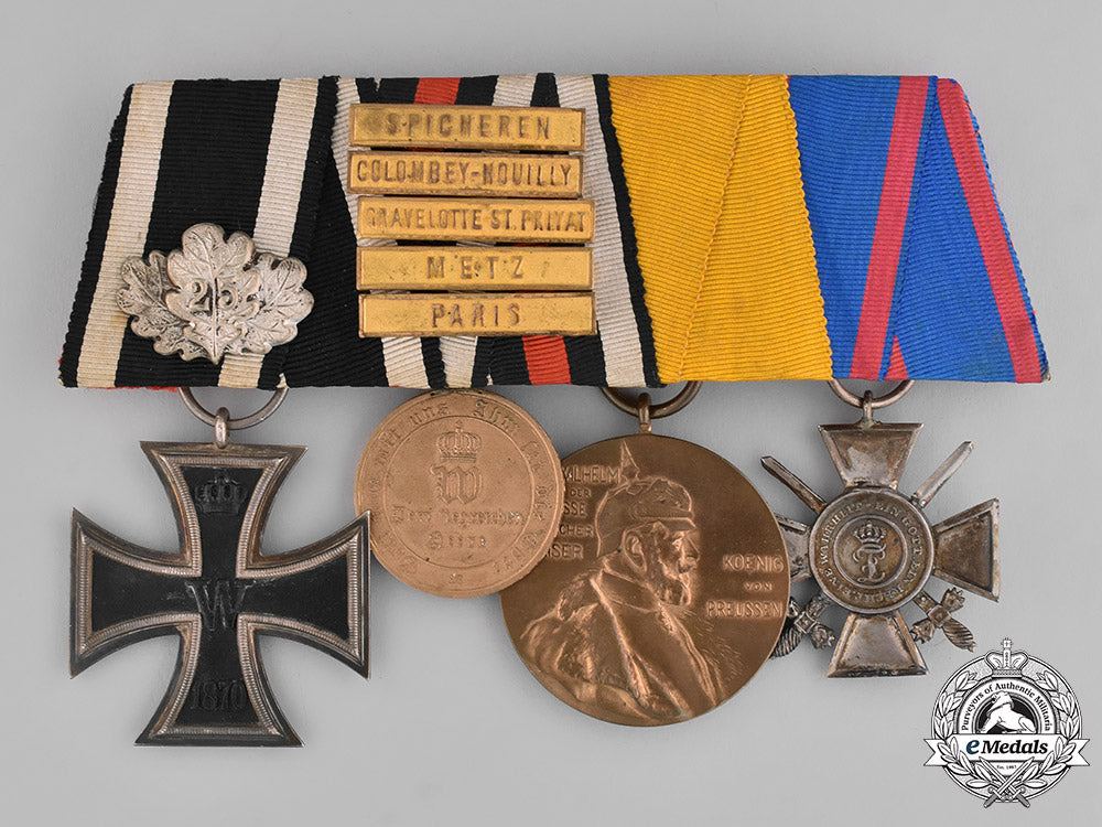 prussia,_state._a_four_piece_medal_bar_with_an_iron_cross_jubilee_oakleaf_and_campaign_bars_emd_2097_1