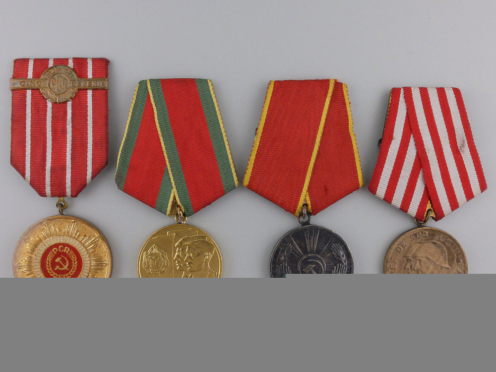 four_romanian_socialist_medals_and_awards_five_romanian_so_55350c0d22295