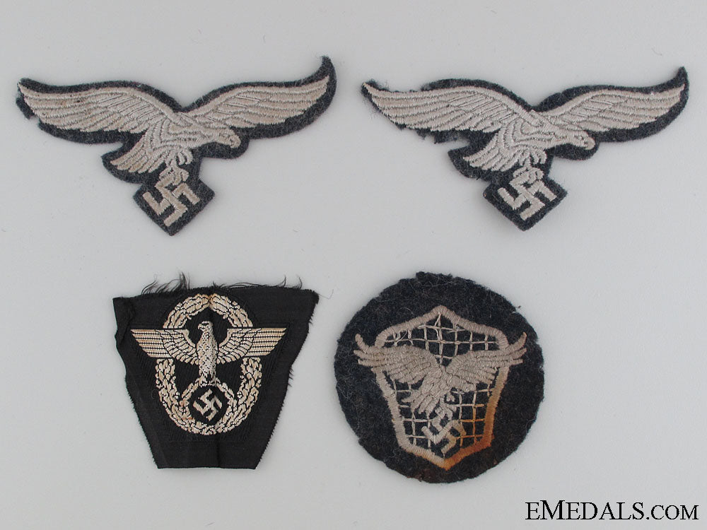 four_pieces_of_cloth_insignia_four_pieces_of_c_526ea938d5e73