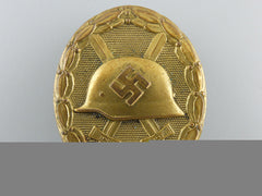 An Early Gold Grade Wound Badge