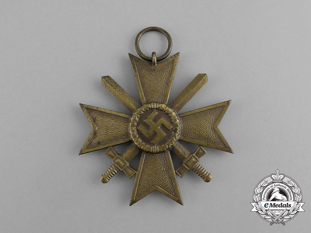 a_war_merit_cross_second_class_with_swords_in_its_packet_of_issue_by_e._schmidhäussler_g_066_1