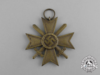 a_war_merit_cross_second_class_with_swords_in_its_packet_of_issue_by_e._schmidhäussler_g_066_1