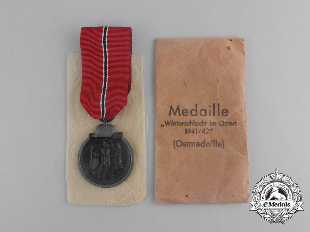 a_second_war_german_eastern_winter_campaign_medal_in_its_packet_of_issue;_by_deschler&_sohn_g_071_1