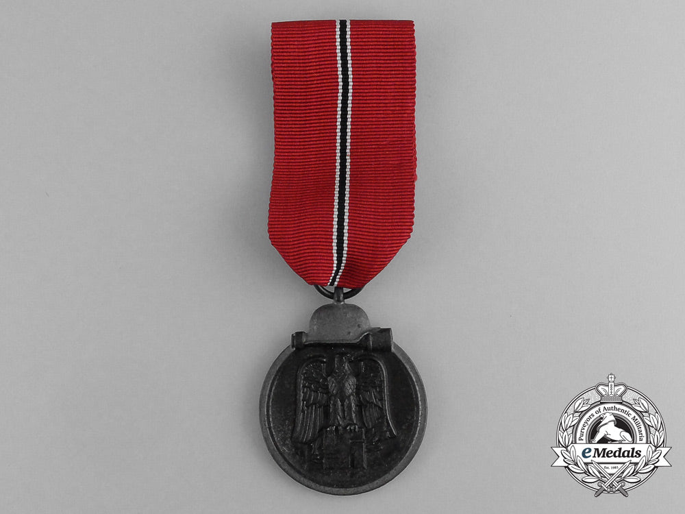 a_second_war_german_eastern_winter_campaign_medal_in_its_packet_of_issue;_by_deschler&_sohn_g_072_1