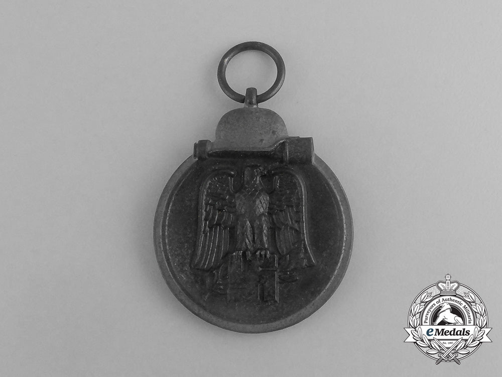 a_second_war_german_eastern_winter_campaign_medal_in_its_packet_of_issue;_by_deschler&_sohn_g_073_1