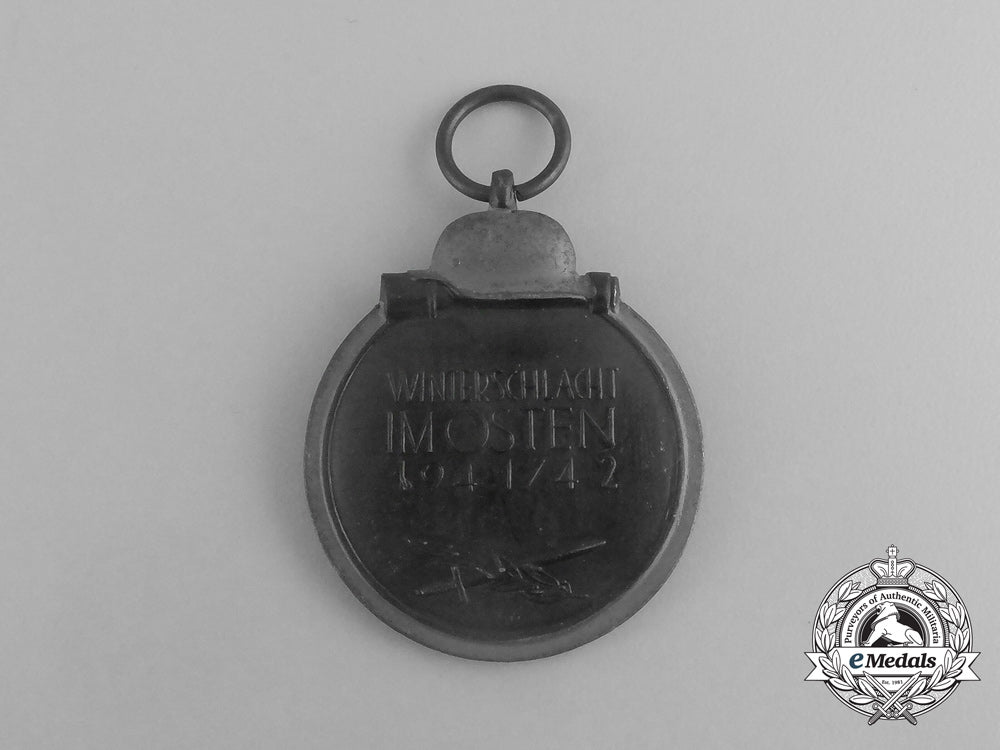 a_second_war_german_eastern_winter_campaign_medal_in_its_packet_of_issue;_by_deschler&_sohn_g_074_1