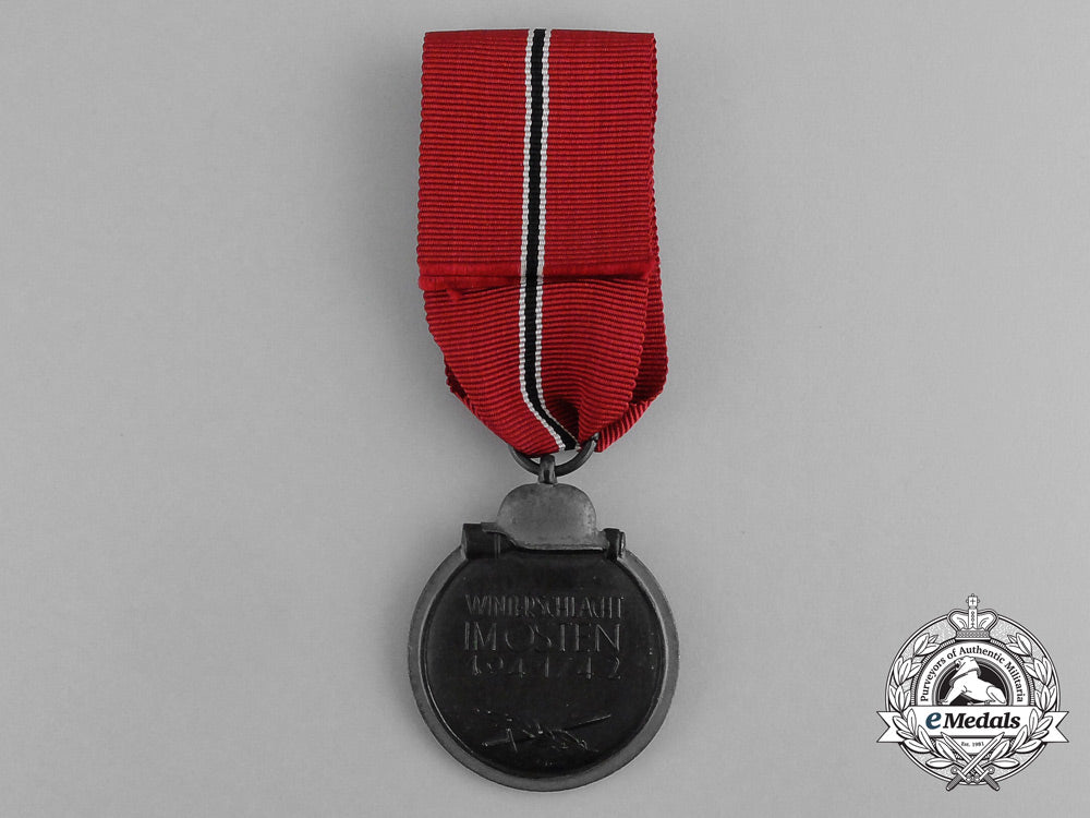 a_second_war_german_eastern_winter_campaign_medal_in_its_packet_of_issue;_by_deschler&_sohn_g_075_1