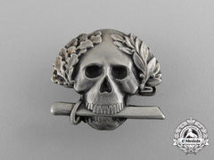 A Second War Italian Black Brigade Skull Badge