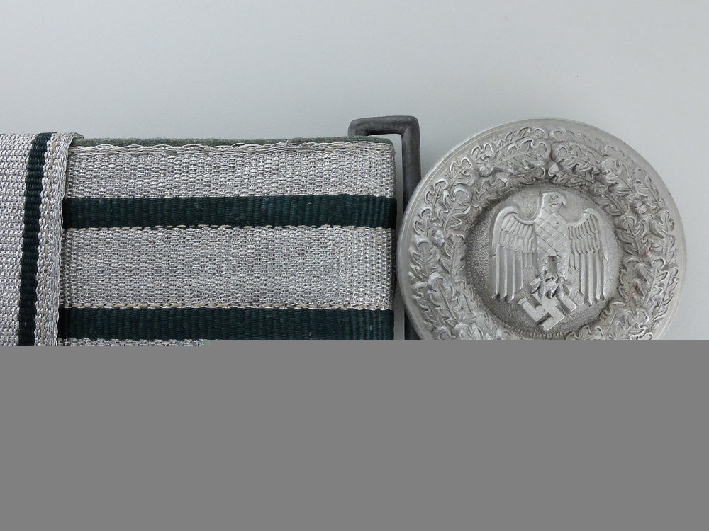 a_german_army_officer’s_brocade_belt_and_buckle;_named_g_567
