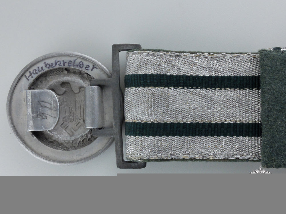a_german_army_officer’s_brocade_belt_and_buckle;_named_g_570