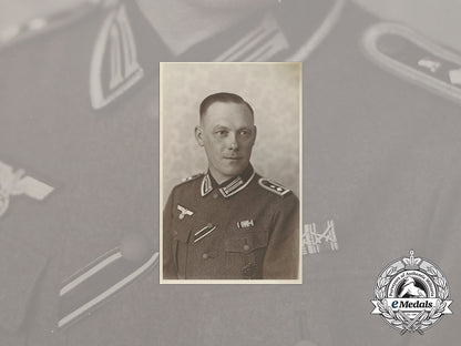 germany,_heer._a_wartime_photo_of_a_feldwebel_with_iron_cross2_nd_class_and_hungarian_war_service_medal_gg_3585_1__1