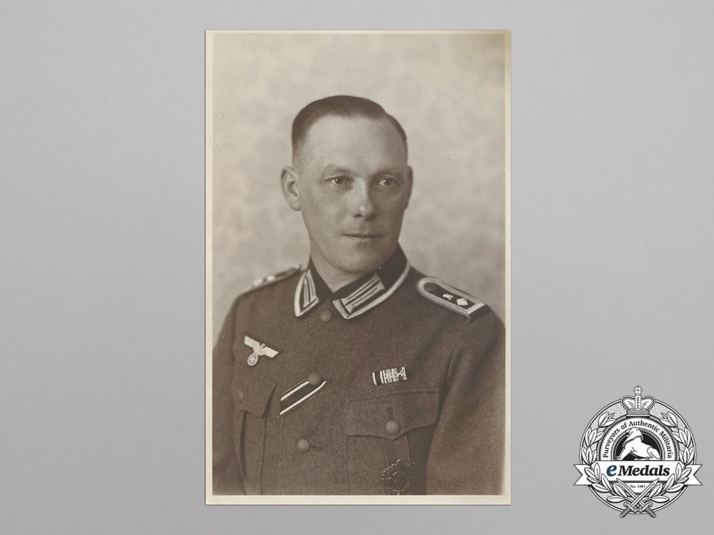 germany,_heer._a_wartime_photo_of_a_feldwebel_with_iron_cross2_nd_class_and_hungarian_war_service_medal_gg_3586_1__1