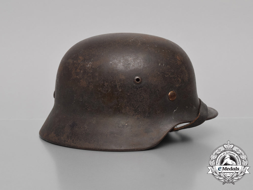 a_single_decal_m35_kriegsmarine_re-_issued_stahlhelm_by_eisenhüttenwerke_h_103