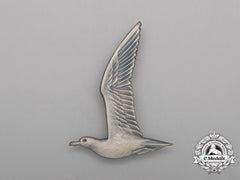 A Dutch “De Nationale Jeugdstorm” Cap Badge