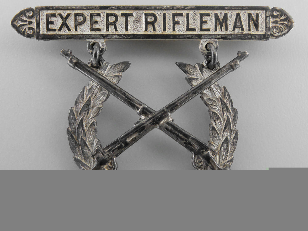 a_marine_corps_expert_rifleman_marksmanship_badge_named_to_private_wilfred_h._knoll_h_398
