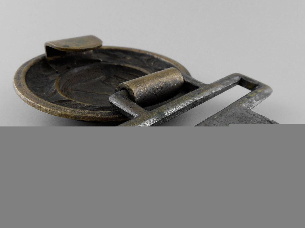a_rheinland_fire_defence_officer's_belt_buckle;_published_example_h_703