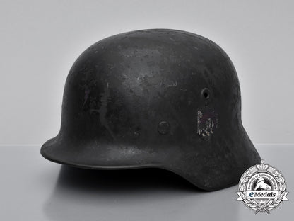 a_single_decal_m40_wehrmacht_heer_helmet_by_v.d._nickelwerke;_bullet_damaged_h_727_1