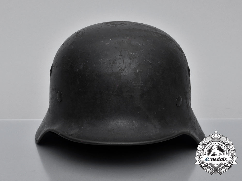 a_single_decal_m40_wehrmacht_heer_helmet_by_v.d._nickelwerke;_bullet_damaged_h_728_1