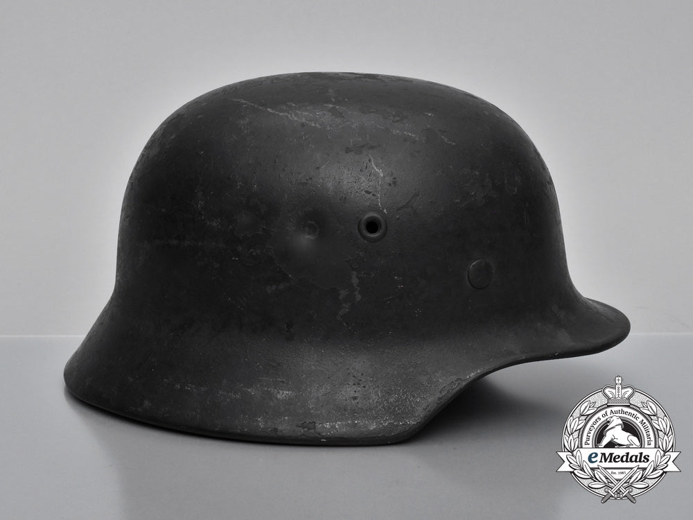 a_single_decal_m40_wehrmacht_heer_helmet_by_v.d._nickelwerke;_bullet_damaged_h_729_1