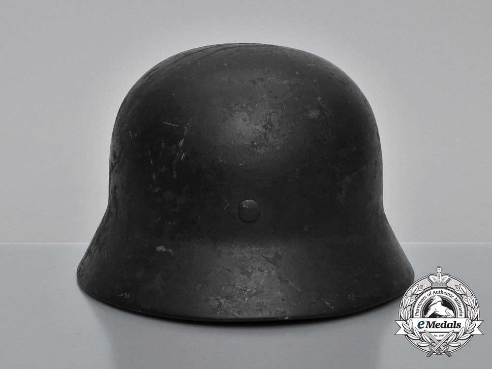 a_single_decal_m40_wehrmacht_heer_helmet_by_v.d._nickelwerke;_bullet_damaged_h_730_1