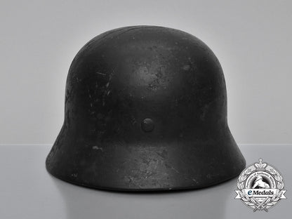 a_single_decal_m40_wehrmacht_heer_helmet_by_v.d._nickelwerke;_bullet_damaged_h_730_1