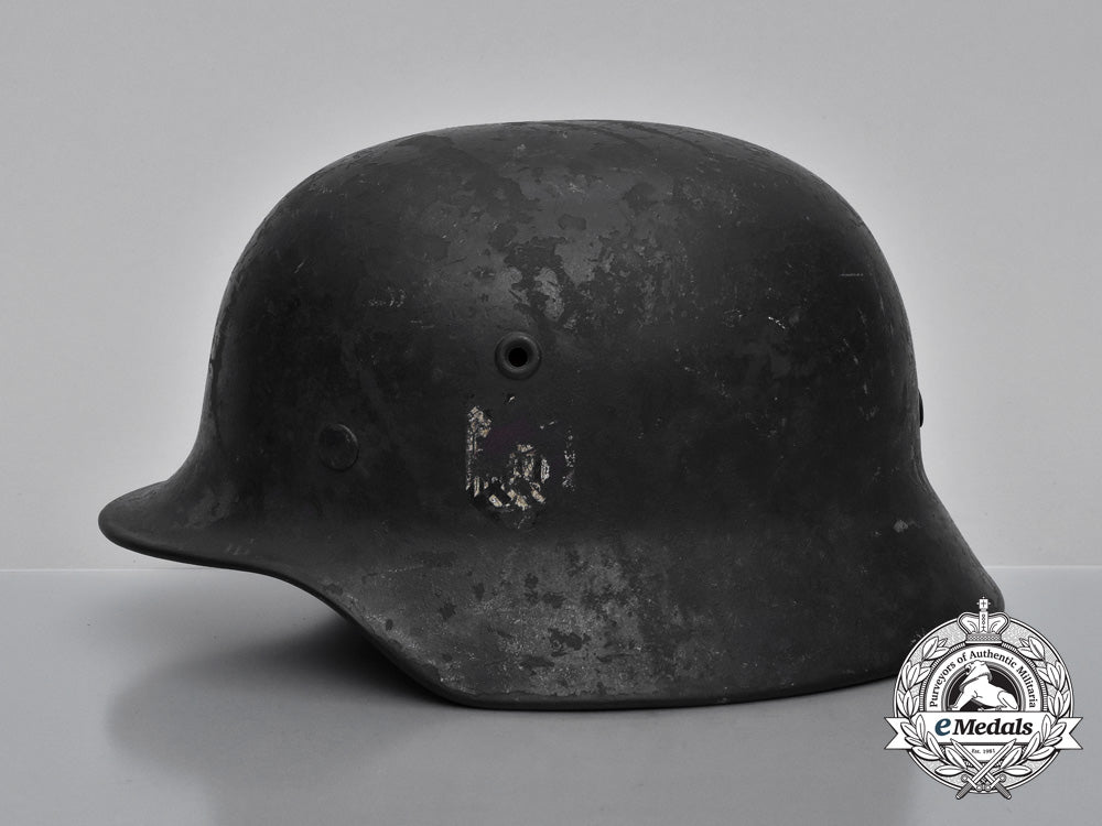 a_single_decal_m40_wehrmacht_heer_helmet_by_v.d._nickelwerke;_bullet_damaged_h_731_1