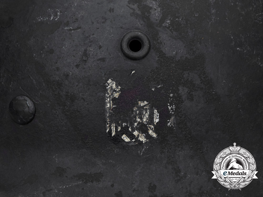a_single_decal_m40_wehrmacht_heer_helmet_by_v.d._nickelwerke;_bullet_damaged_h_732_1