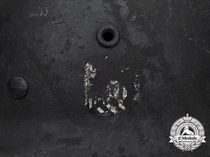 a_single_decal_m40_wehrmacht_heer_helmet_by_v.d._nickelwerke;_bullet_damaged_h_732_1