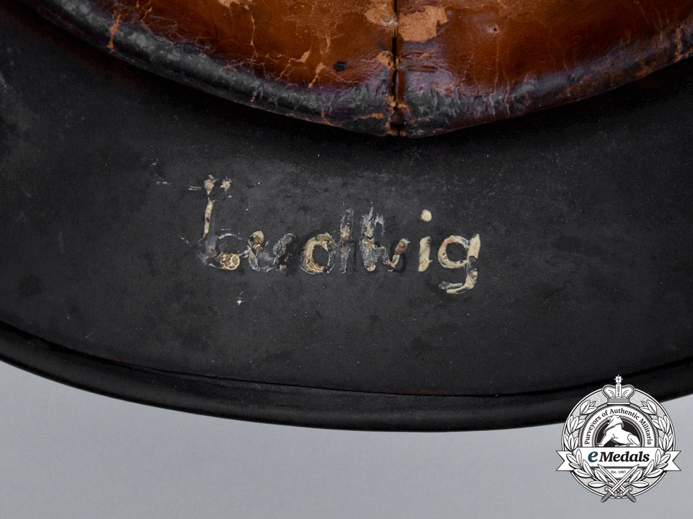 a_single_decal_m40_wehrmacht_heer_helmet_by_v.d._nickelwerke;_bullet_damaged_h_735_1