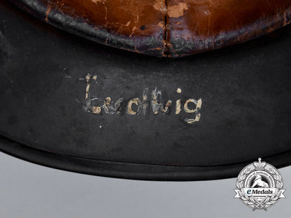 a_single_decal_m40_wehrmacht_heer_helmet_by_v.d._nickelwerke;_bullet_damaged_h_735_1