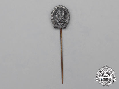 a_silver_grade_drl_sports_badge_miniature_stick_pin_on_its_original_salesman's_board_h_800_1