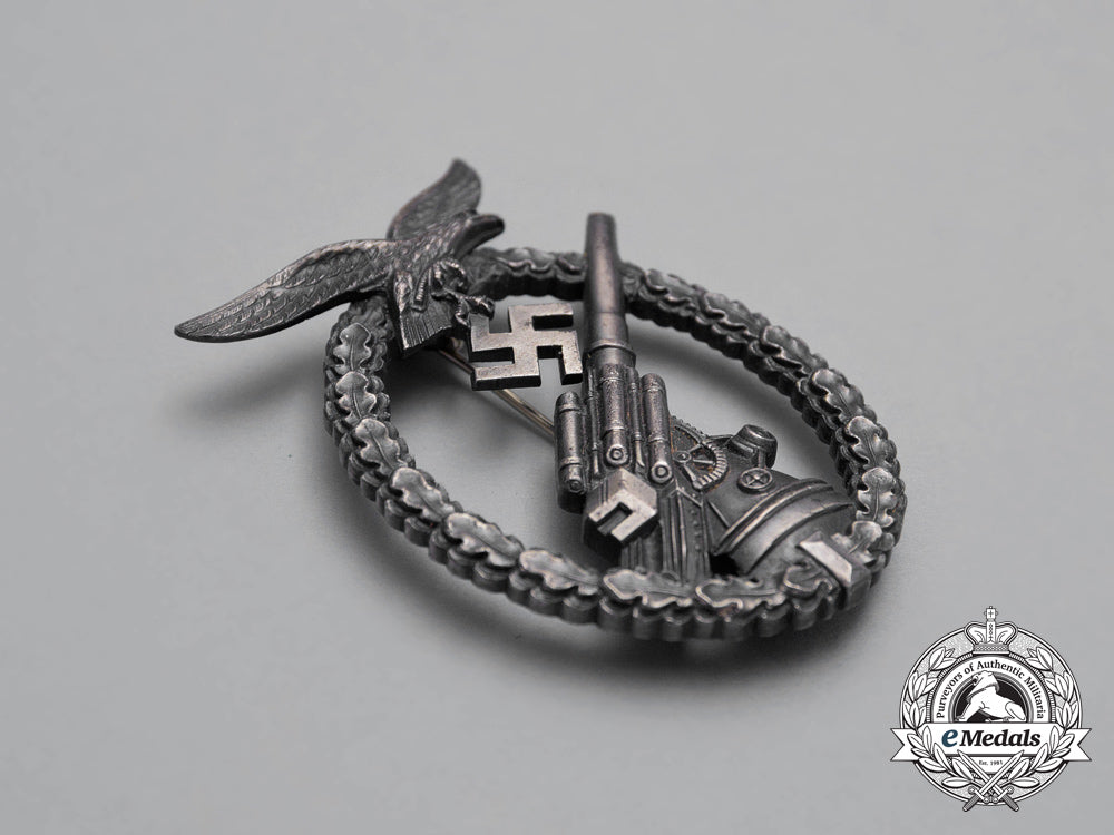 an_early_luftwaffe_flak_badge_in_its_case_of_issue_h_831_1