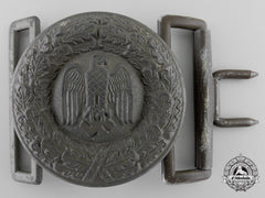 A Tropical Army Officer's Belt Buckle; Published Example